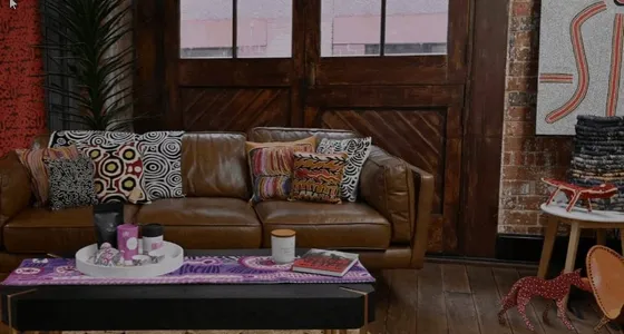 A living room styled with Aboriginal art and homewares from Welcome to Country