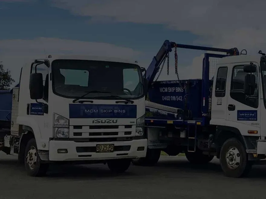 Two MCM Skip Bins trucks loaded with skips