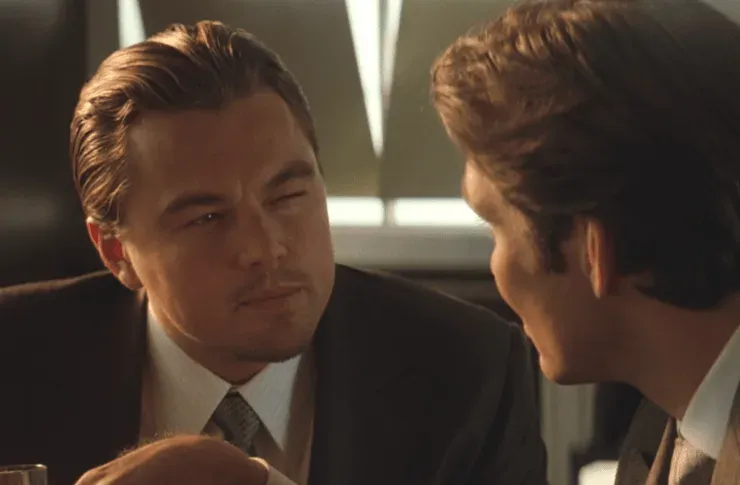 Leonardo DiCaprio knowing look meme from Inception